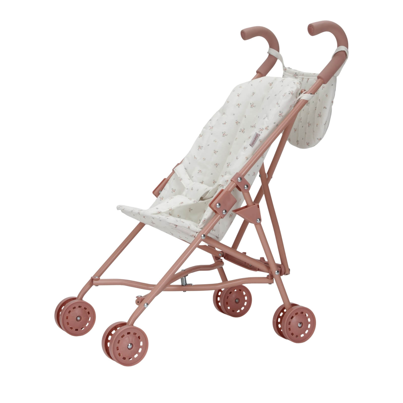 A pink metal doll stroller with four wheels and a white meadows design on the fabric.