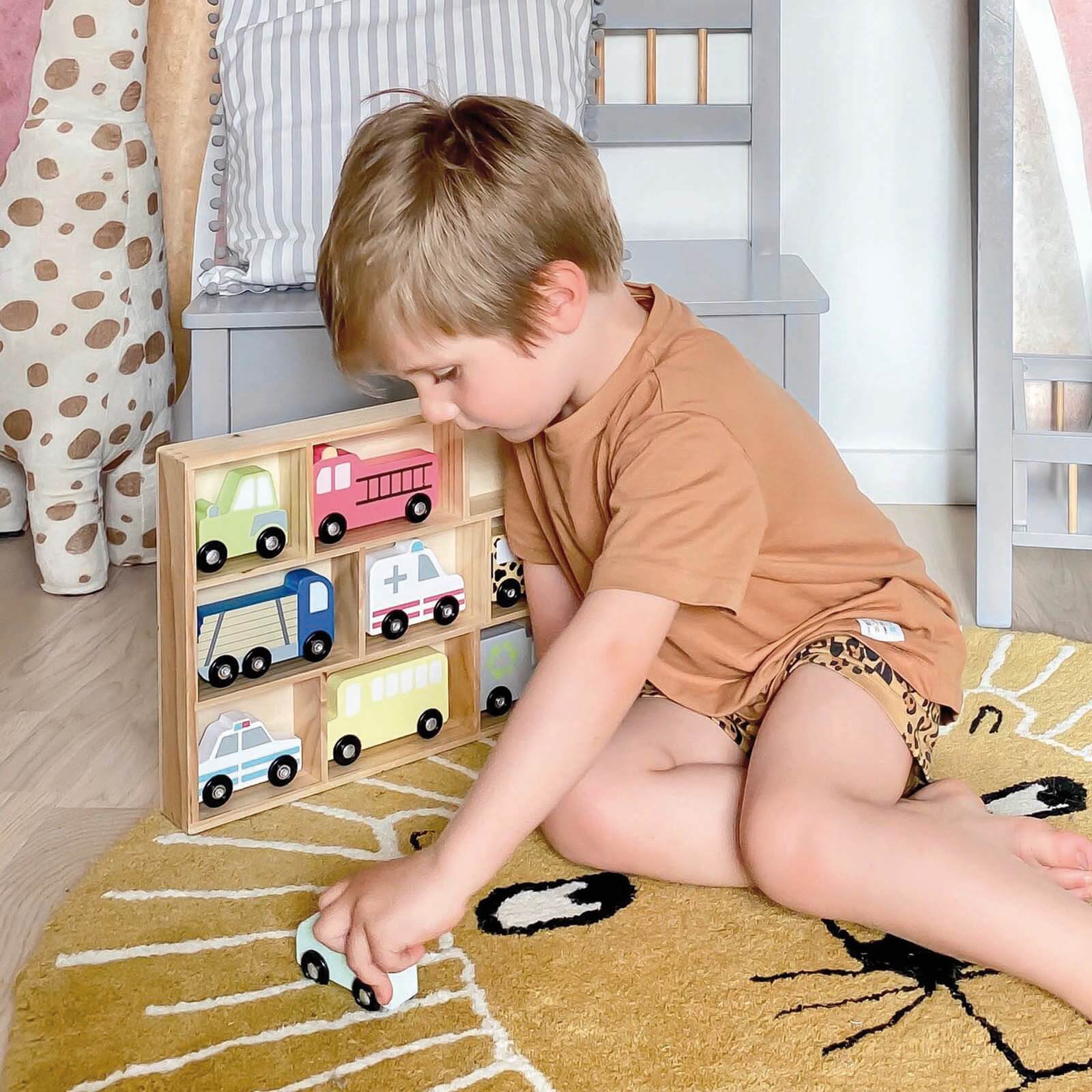 Wooden Cars In Shelf Display