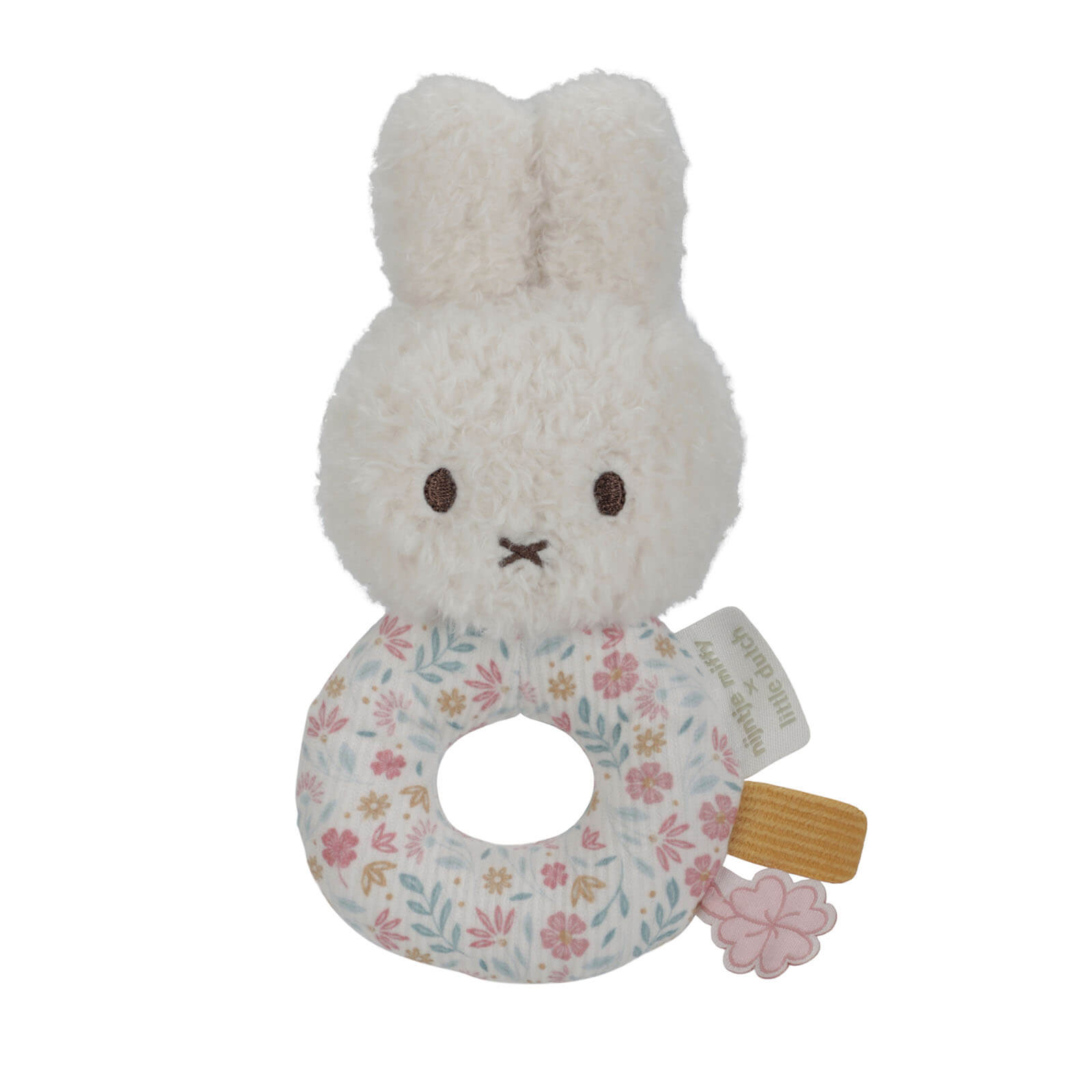 A white plush rattle in the shape of a rabbit with a ring-shaped base decorated with a floral Lucky Blossom print. The rattle has a friendly face, small labels, and a wooden ring at the bottom.
