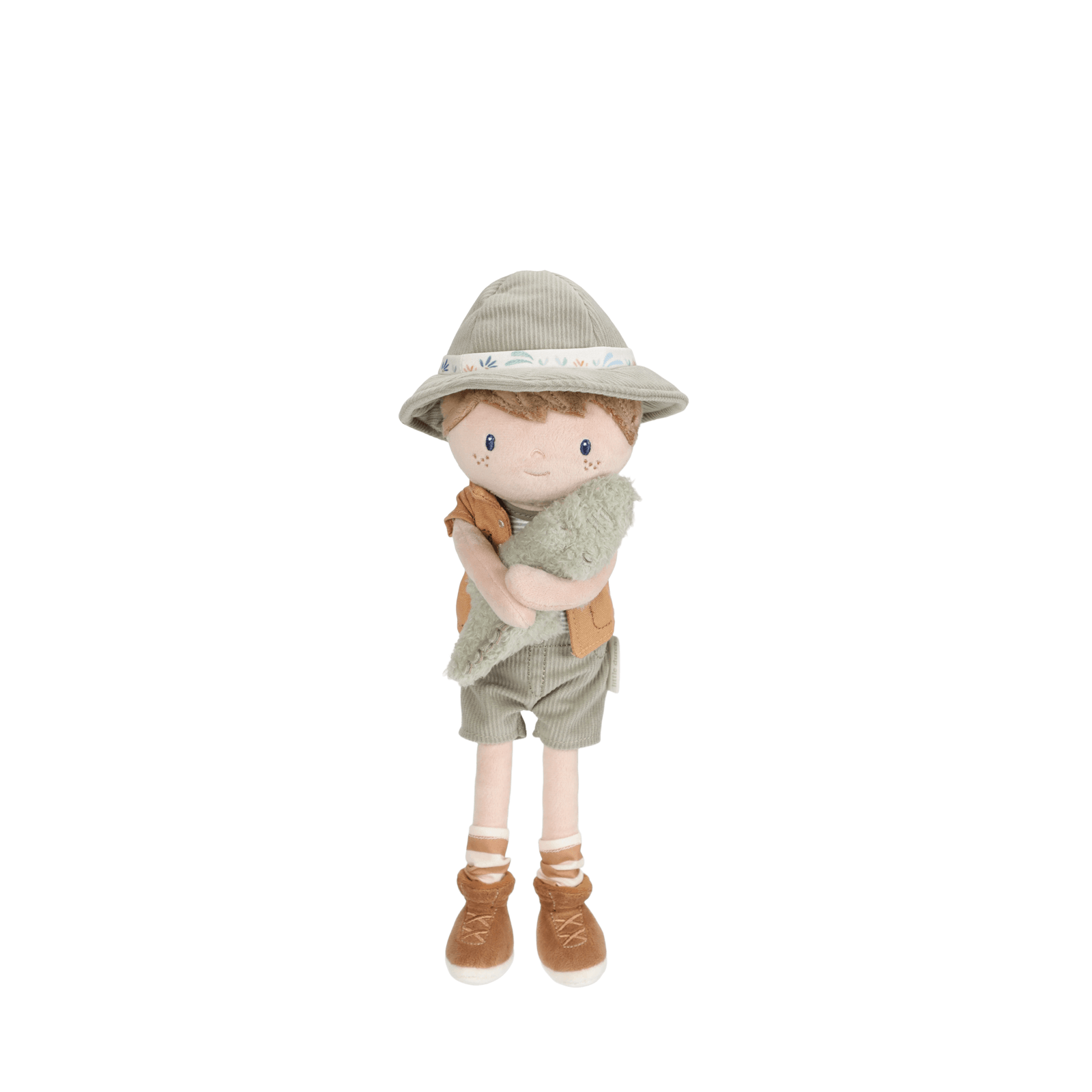 Toy doll dressed as an explorer with a hat, vest, shorts, and boots on a white background