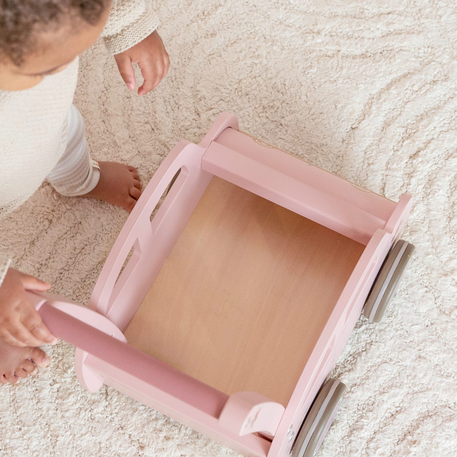 Pink wooden baby walker online