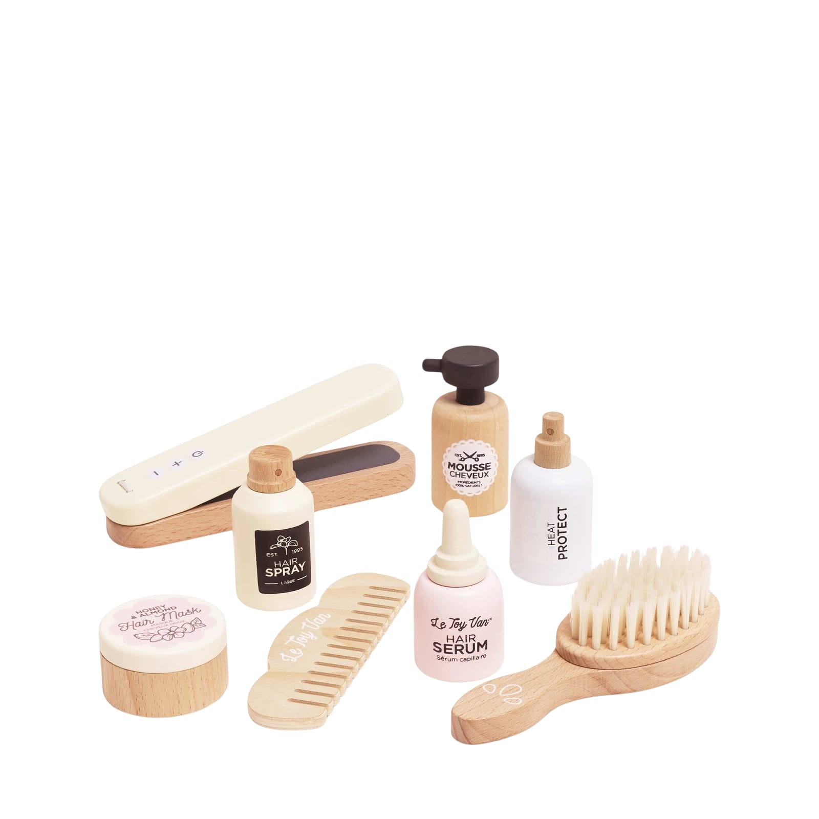 Collection of pretend hair care products including bottles, a comb, and a brush on a white background