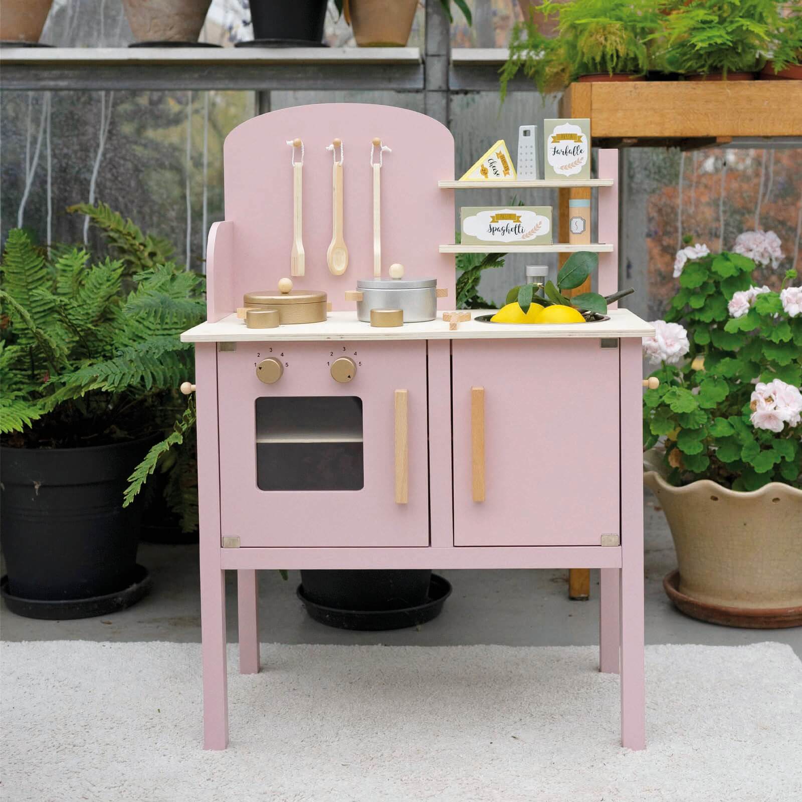 Pink Kitchen with Pots and Accessories